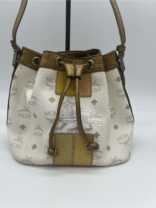 MCM Handbags - Authentic MCM White Visetos Drawstring Bucket Bag Metallic Bronze Trim